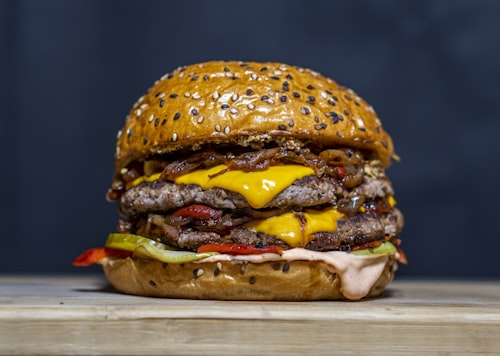 Triple-stacked cheeseburger with sauce